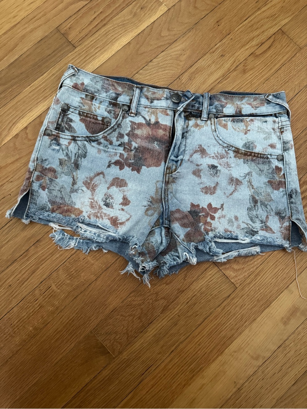 Free People Light Blue Denim Shorts with Rust Floral Print